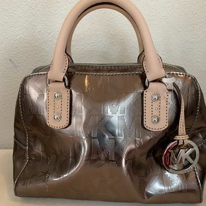 Brand new Michael Kors purse with detachable long strap.